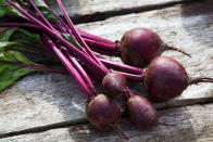 Next time you pick up a bunch of beets, chop the greens off the top, wash them, and store them in the fridge as you would with kale. Blanch and toss the leaves with steamed beets, or blend into a soup for a slightly sweet, earthy addition.