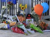 <p>A memorial of flowers and photos are placed outside a gate at Marlins Park in honor of Miami Marlins starting pitcher Jose Fernandez who was killed in a boating accident. The game between the Atlanta Braves and Marlins was cancelled. Mandatory Credit: Robert Mayer-USA TODAY Sports </p>