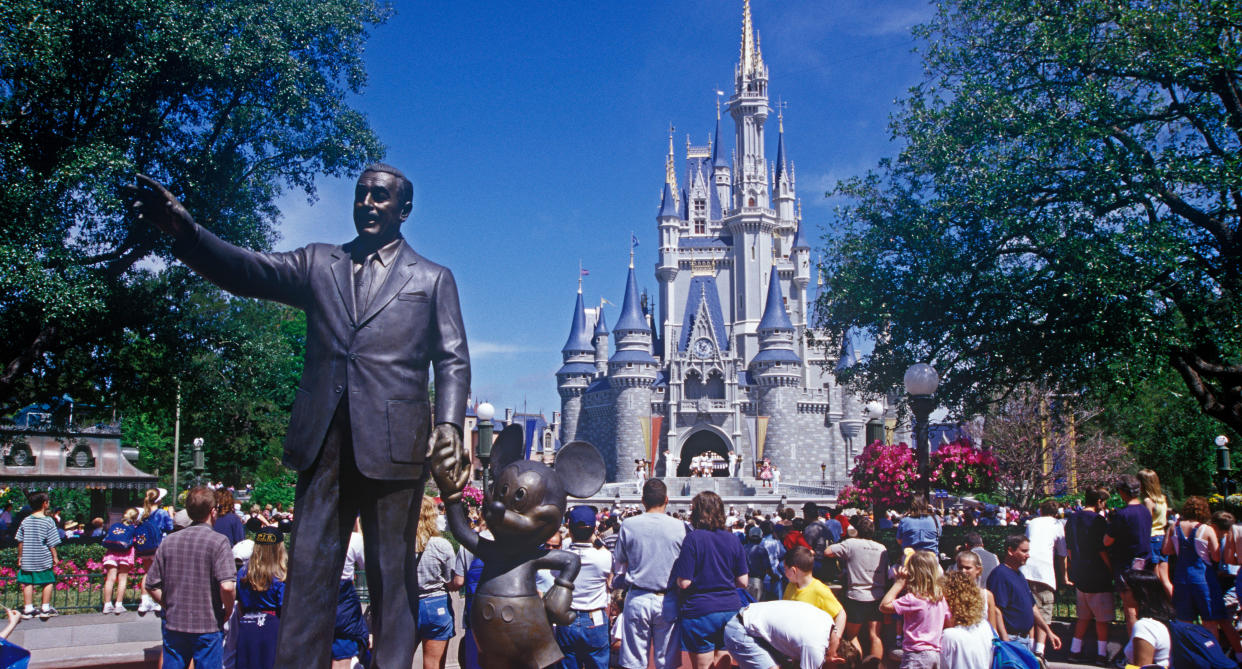 A statue of Walt Disney stands at the front of Disney World. (Photo: Mira/Alamy Stock Photo)