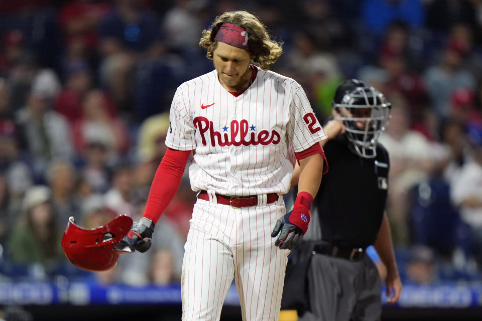 Philadelphia Phillies' Alec Bohm reacts after striking out against Washington Nationals pitcher Austin Voth during the sixth inning of a baseball game, Tuesday, June 22, 2021, in Philadelphia. (AP Photo/Matt Slocum)