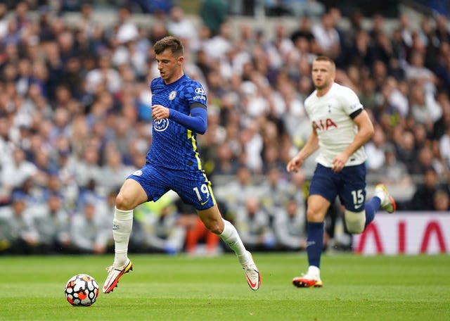 Mason Mount races past Eric Dier