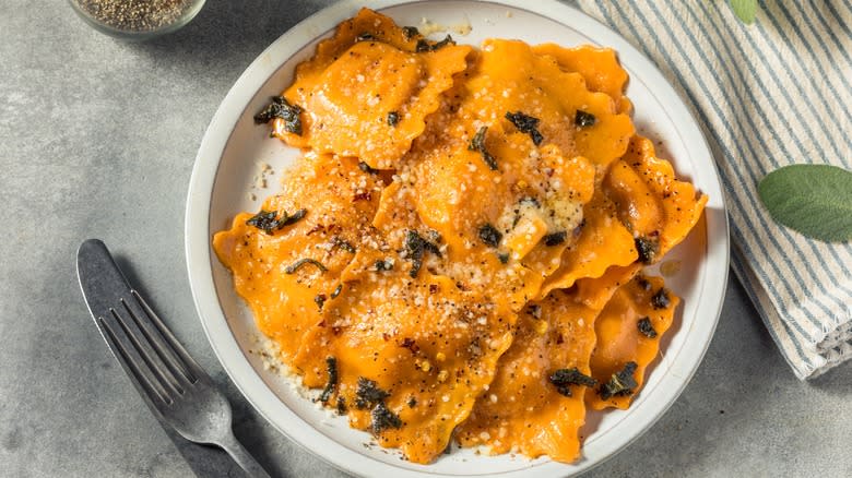 pumpkin stuffed pasta on white plate