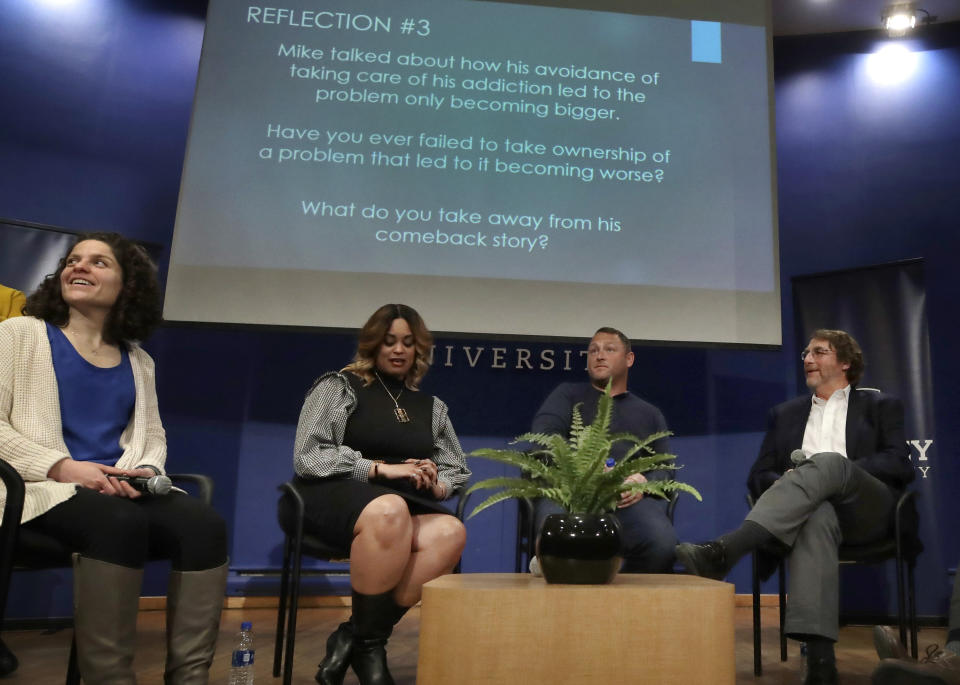 In this March 5, 2019 photo, panel members, from left, Angela Giordano, Natalie Baucum, Mike Duggan and Fred Ledley participate in an event at Bentley University, in Waltham, Mass., where professors and alumni shared some of their worst setbacks to illustrate that even successful people sometimes fail. A growing number of U.S. colleges are trying to "normalize" failure for a generation of students who increasingly struggle with stress, anxiety and the ability to bounce back from adversity. (AP Photo/Elise Amendola)