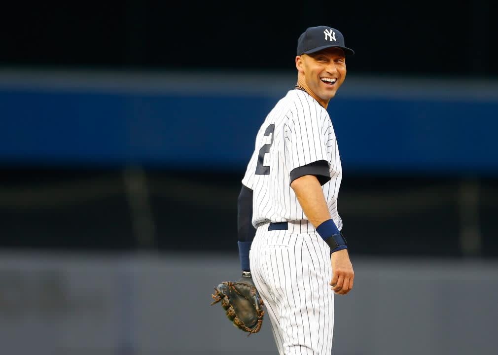 Derek Jeter #2 of the New York Yankees smiles during a game.