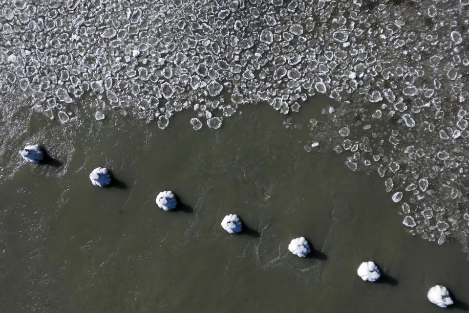 Pancake ice floats on Lake Michigan, Thursday, Feb. 2, 2023, in Chicago. (AP Photo/Erin Hooley)