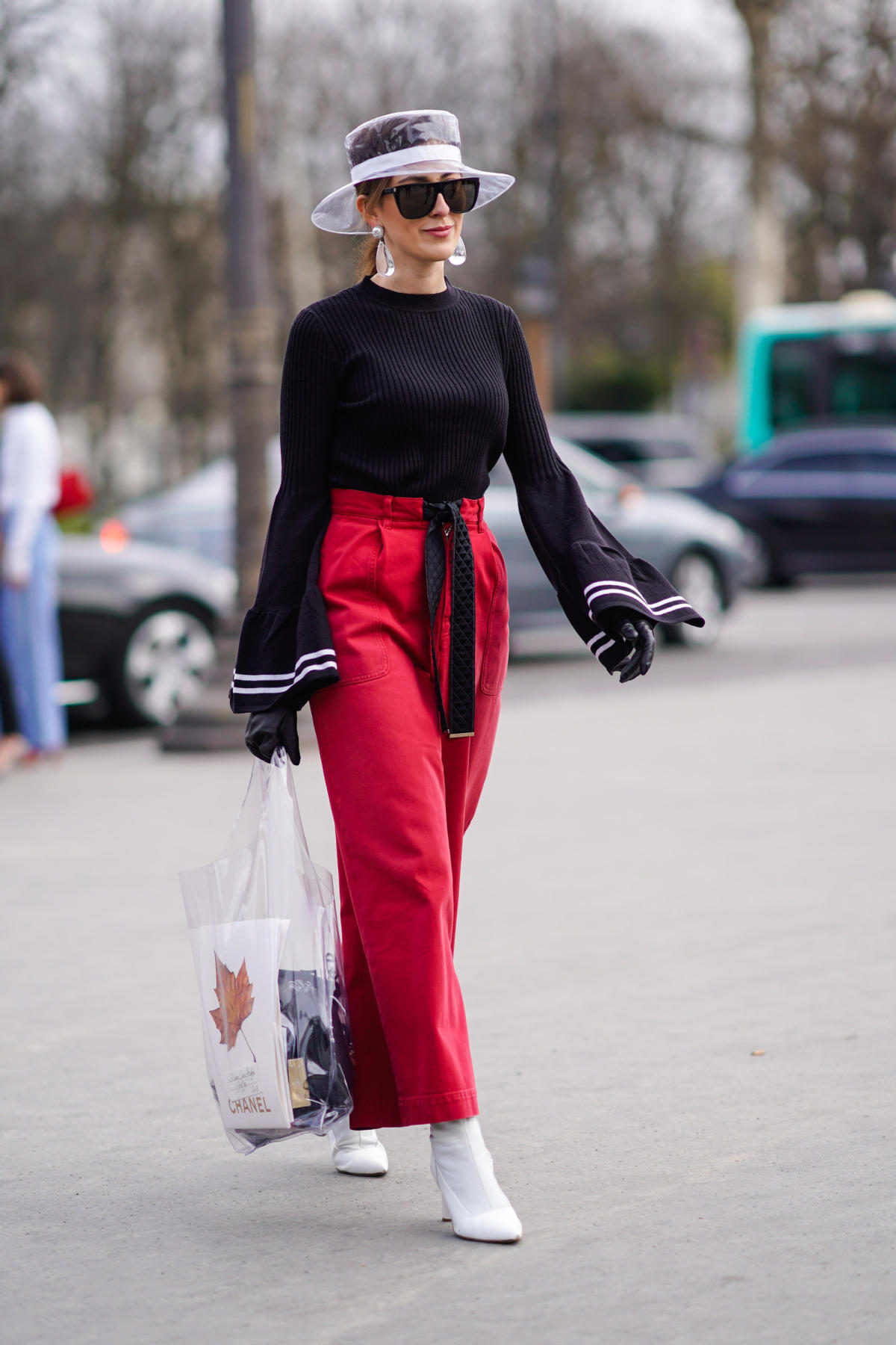 Chanel Is Selling a $1,150 Plastic Rain Hat—and People Are Actually Wearing  It