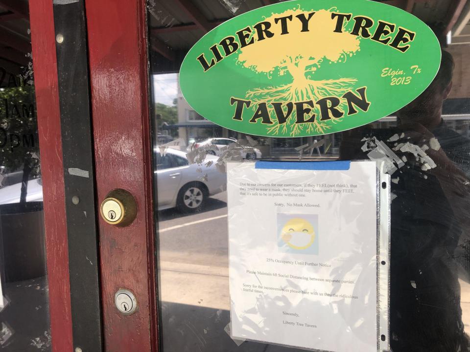 The Liberty Tree Tavern in downtown Elgin has posted a sign outside its entrance saying that anyone wearing a mask will not be allowed in.