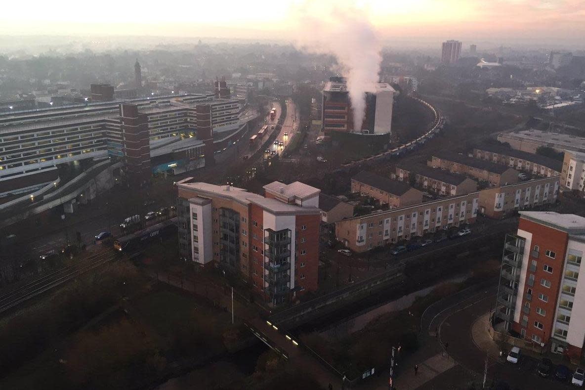 Derailed: the train, seen in front of the building emitting steam, was derailed at Lewisham: LauraBullas