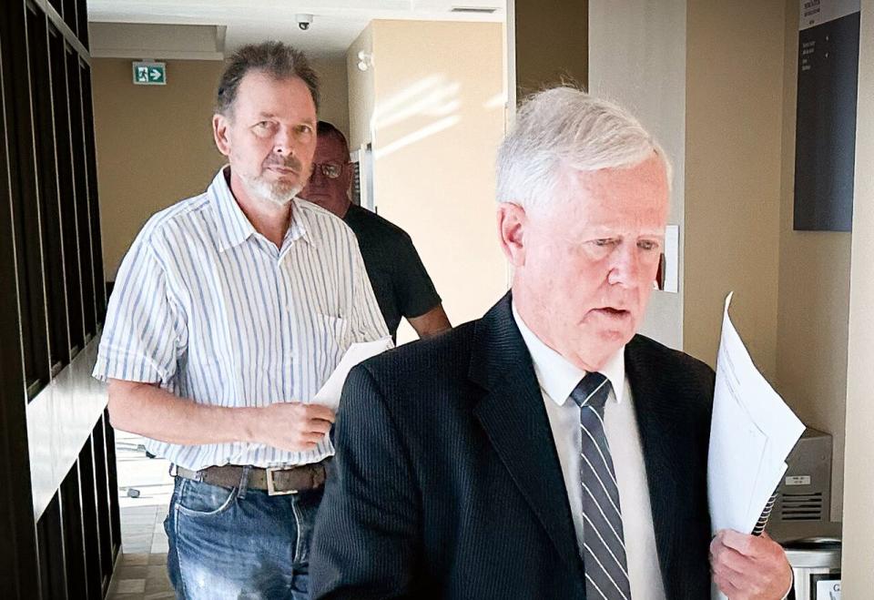 Through his lawyer Wayne MacMillan, right, Frank Eckhardt declined to address the court on Friday and declined a request for comment from CBC News.