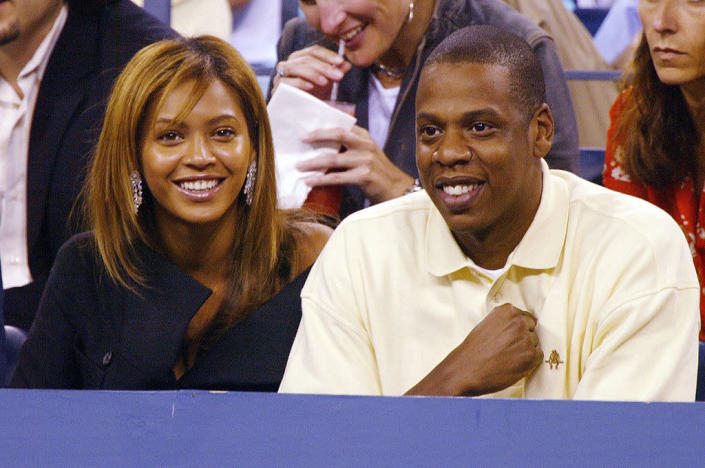beyonce is with jay z at a tennis game