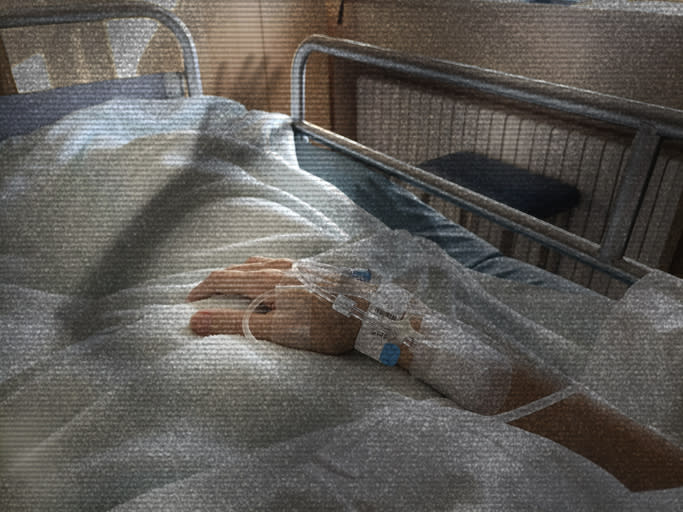 a person in a hospital bed