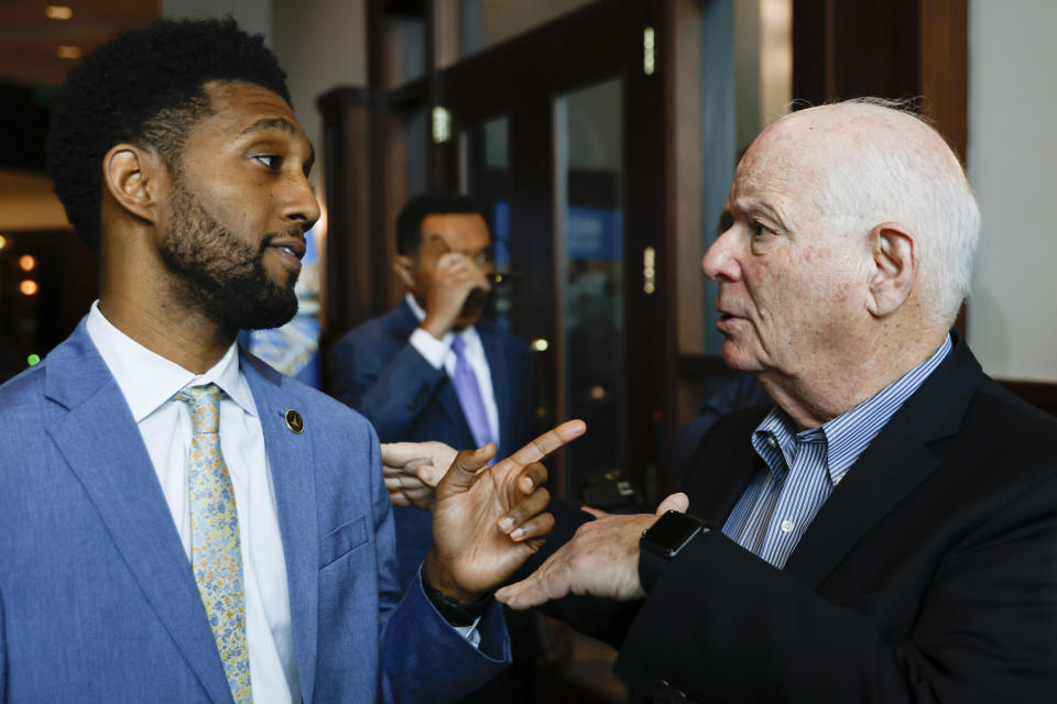 Baltimore Mayor Brandon Scott and Sen. Ben Cardin, D-Md., speak following a press conference at the Small Business Administration business recovery center, Thursday, April 4, 2024, in Baltimore. (AP Photo/Julia Nikhinson)