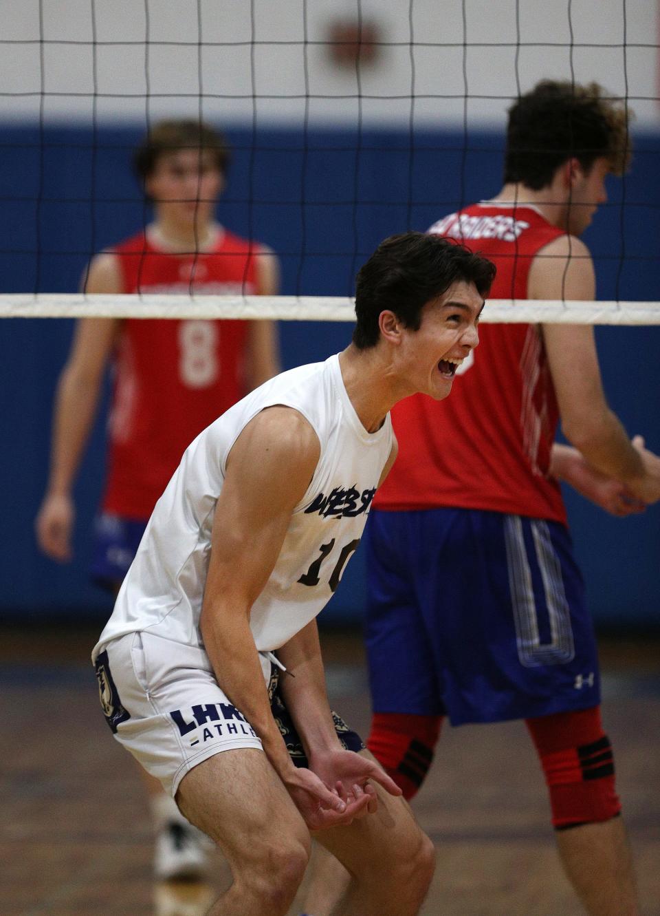 Webster’s Jacob Grams celebrates in the Class A final against Fairport.