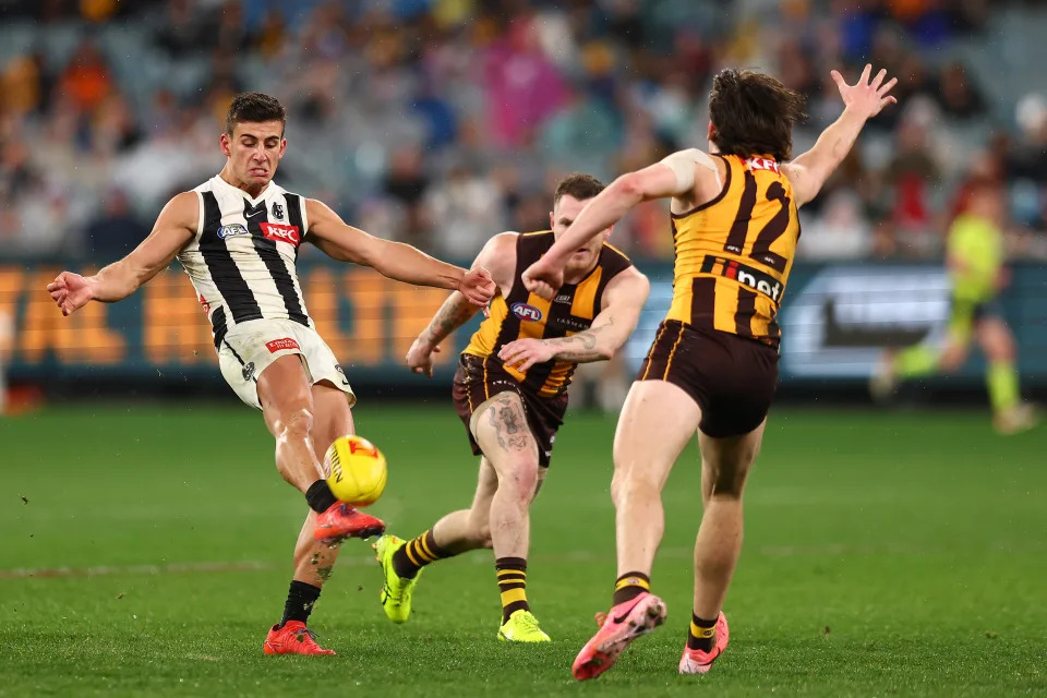 MELBOURNE, AUSTRALIA - JULY 20: Nick Daicos of the Magpies kicks during the round 19 AFL match between Hawthorn Hawks and Collingwood Magpies at Melbourne Cricket Ground on July 20, 2024 in Melbourne, Australia. (Photo by Graham Denholm/AFL Photos/via Getty Images)