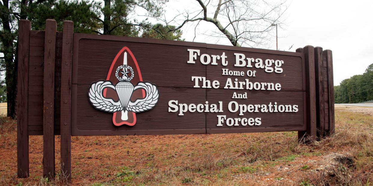 FILE - In this Jan. 4, 2020, file photo a sign for at Fort Bragg, N.C., is shown. Defense Secretary Mark Esper and Army Secretary Ryan McCarthy, both former Army officers, put out word that they are “open to a bipartisan discussion” of renaming Army bases like North Carolina’s Fort Bragg that honor Confederate officers associated by some with the racism of that tumultuous time. (AP Photo/Chris Seward, File)