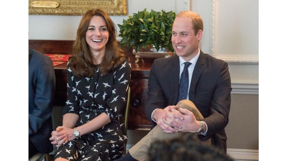 Kate Middleton and Prince William sitting in Kensington Palace