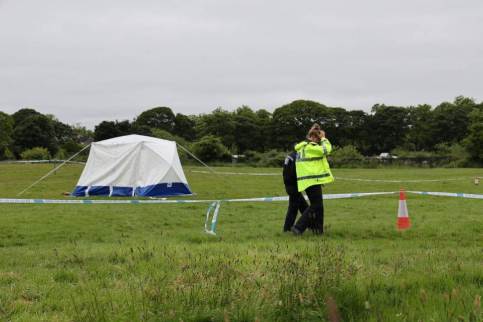 The Northern Echo: Police at the scene where a man's body was found in a field at Highbury, in Jesmond, Newcastle,