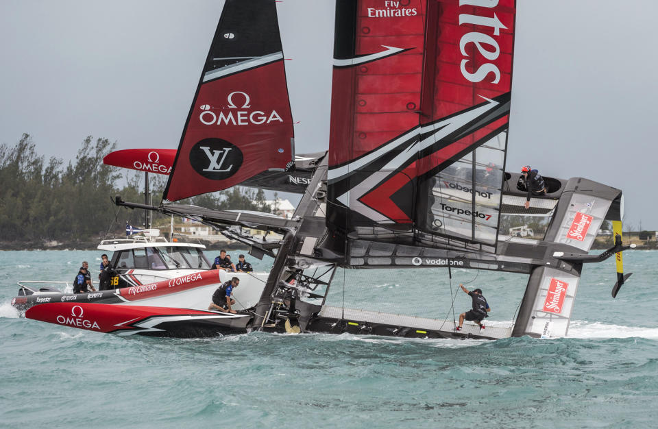 <p>In this photo provided by America’s Cup Event Authority, Emirates Team New Zealand is righted after capsizing during an America’s Cup challenger semifinal against Great Britain’s Land Rover BAR on the Great Sound in Bermuda on Tuesday, June 6, 2017. (Ricardo Pinto/ACEA via AP) </p>