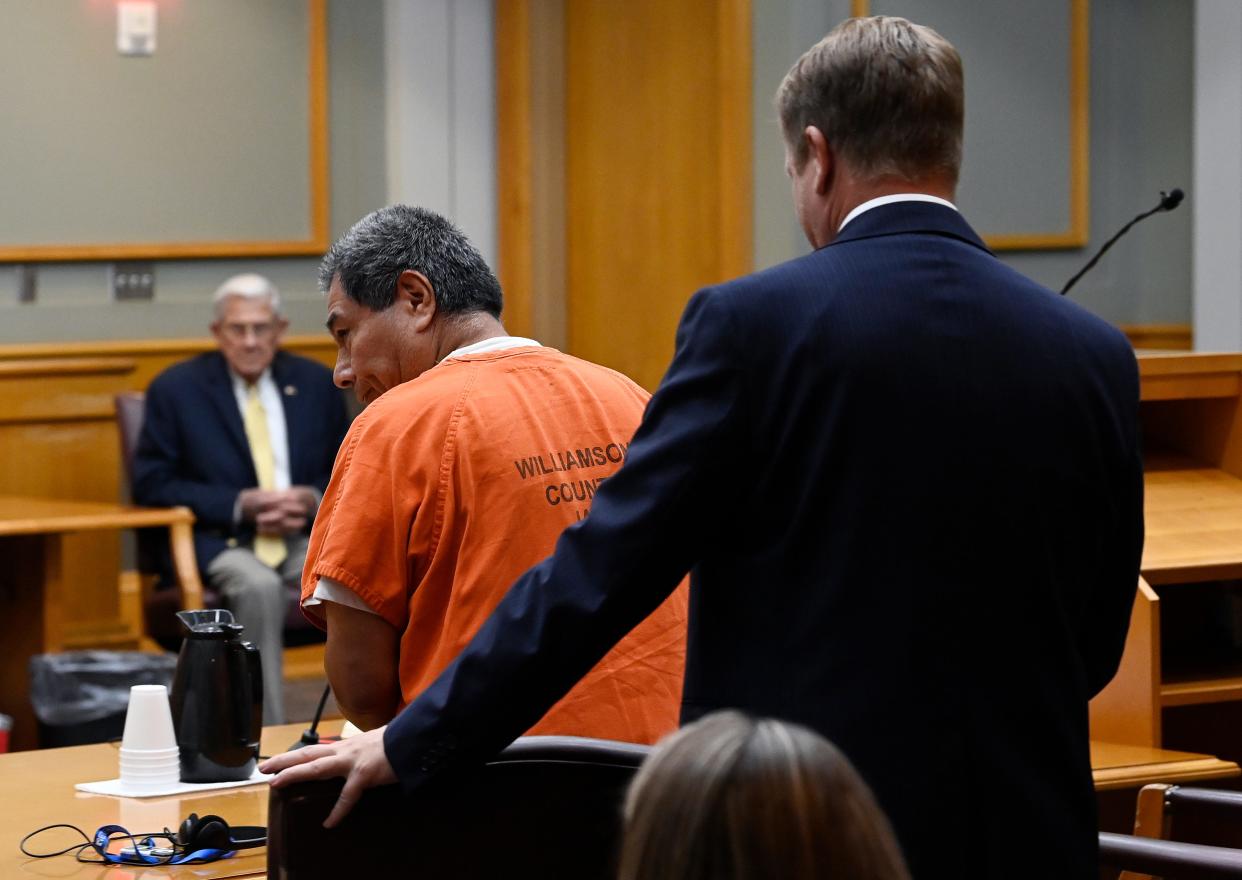 Defense attorney James Elkins helps his client Camilo Hurtado Campos sit in the courtroom before a motion hearing to dismiss an arrest warrant in his case at the Williamson County Courthouse on Tuesday, July 25, 2023, in Franklin, Tenn. Campos a former Franklin soccer coach is accused of drugging and raping a dozen young boys from the ages of 9 to 17.
(Mark Zaleski / The Tennessean)