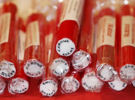 Brighton rock with the slogan "Labour Rocks" written through is displayed on a trade stand at the Labour party's annual conference in Brighton, Britain, in this September 22, 2013 file photo. REUTERS/Luke MacGregor/Files