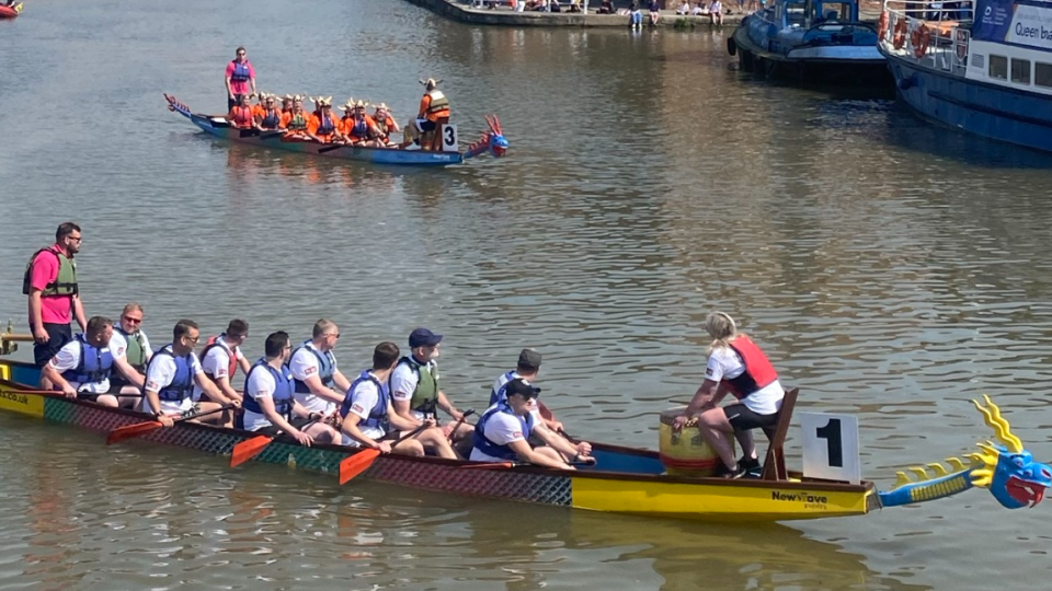 Image of rowers at the dragon boat race