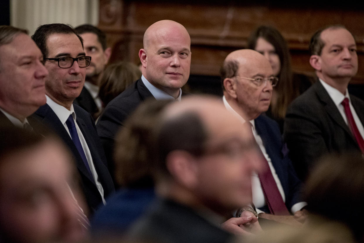 Acting AG Matt Whitaker (third from left) played football at Iowa from 1990-1992. (AP Photo/Andrew Harnik)