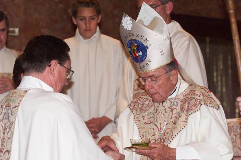 In a 2000 ceremony, newly ordained Rev. Robert Cook (left) was annointed by Bishop Joseph Hart during the Rite of Ordination in St. Marys Cathedral. Hart, a former bishop in the Roman Catholic Diocese of Cheyenne, Wyo., was twice accused of sexual misconduct with boys while he was a priest in Kansas City.