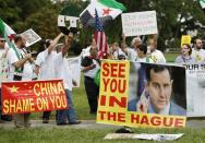 A group of Syrian Americans rally in favor of proposed U.S. military action against the Bashar al-Assad regime, outside the U.S. Capitol in Washington, September 9, 2013. REUTERS/Jonathan Ernst