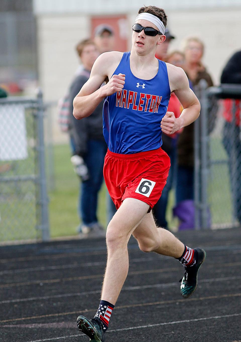 Mapleton's Isaik Schoch competes in the 1600 meter run during the Forest Pruner Track Invitational at Crestview High School on Friday, April 22, 2022. TOM E. PUSKAR/TIMES-GAZETTE.COM