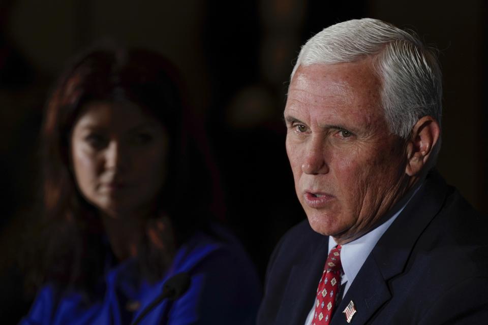 Former Vice President Mike Pence and Wisconsin Rebublican gubernatorial candidate Rebecca Kleefisch participate in a round table discussion Wednesday, Aug. 3, 2022, in Pewaukee, Wis. (AP Photo/Morry Gash)