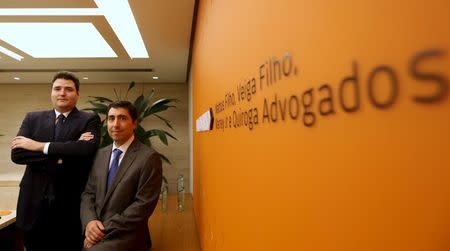 Lawyers Renato Portella (R) and Thiago Pinheiro pose for Reuters in their office in Sao Paulo, Brazil, March 7, 2016. To match Insight BRAZIL-CORRUPTION/COMPLIANCE Picture taken March 7, 2016. REUTERS/Paulo Whitaker
