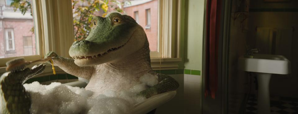 Lyle the crocodile takes a bath in an image from the movie "Lyle, Lycle, Crocodile."