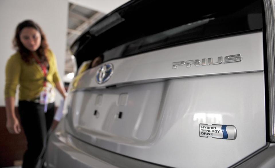 Cars have also had tremendous historical meaning. In the case of this Prius, owning a hybrid suggests eco-awareness and progressive bona fides. AFP via Getty Images