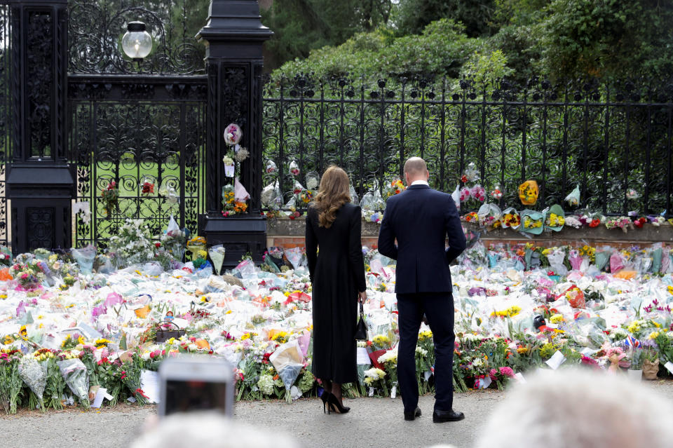 Britain's William, Prince of Wales and Catherine, Princess of Wales look at floral tributes, following the death of Britain's Queen Elizabeth, at Sandringham Estate in eastern England, Britain, September 15, 2022. REUTERS/Marko Djurica