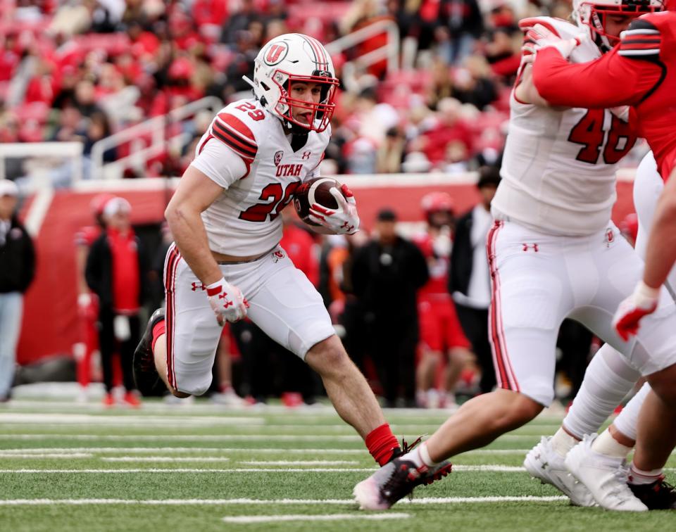 White’s Daniel Wood follows his blocking as The University of Utah football team plays in the 22 Forever Game at Rice Eccles Stadium in Salt Lake City on Saturday, April 22, 2023. the white team won 38-28 over red. | Scott G Winterton, Deseret News