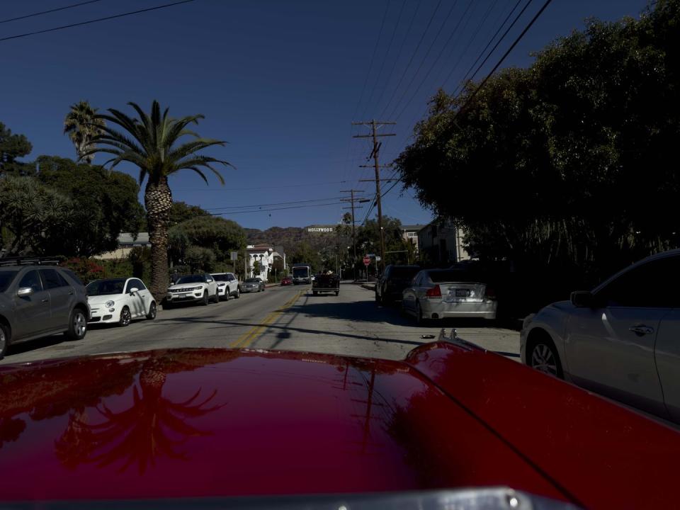 a street with cars parked along it