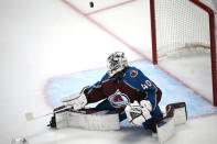 Colorado Avalanche goaltender Alexandar Georgiev deflects the puck in the first period of Game 7 of an NHL first-round playoff series against the Seattle Kraken, Sunday, April 30, 2023, in Denver. (AP Photo/David Zalubowski)