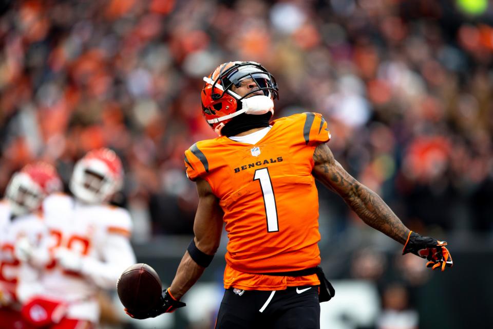 Cincinnati Bengals wide receiver Ja'Marr Chase (1) celebrates after scoring on a 72-yard touchdown catch in the first half of the NFL game between the Cincinnati Bengals and the Kansas City Chiefs on Sunday, Jan. 2, 2022, at Paul Brown Stadium in Cincinnati. 