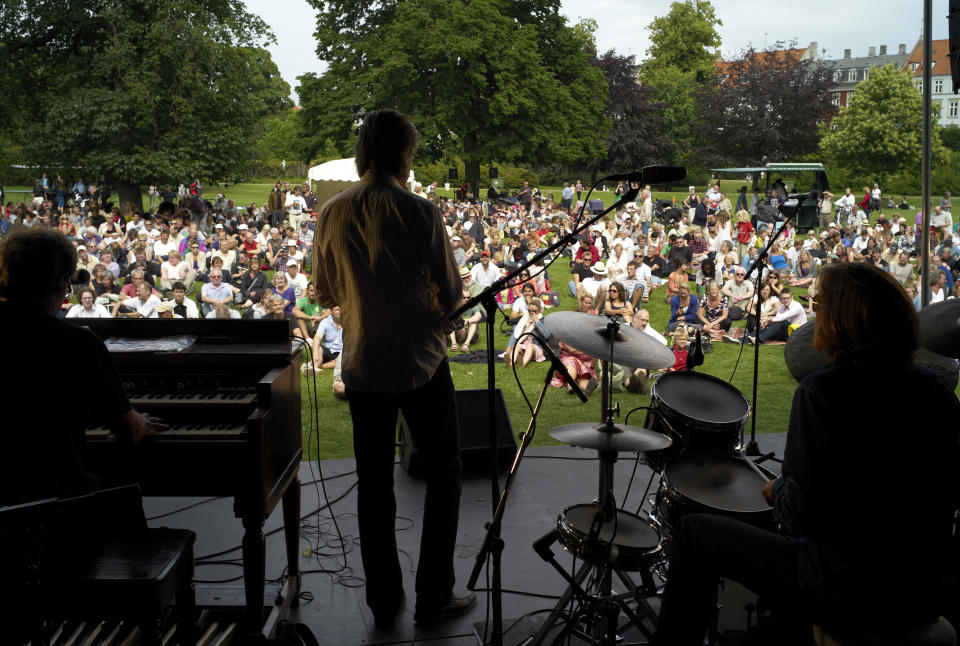 FILE - This is a July 7, 2009, file photo of spectators enjoying the Copenhagn Jazz Festival in the King's Garden, Copenhagen Center, Denmark. Copenhagen was home to a prominent jazz scene in the 1960s and 1970s, when many American jazz musicians settled here. The annual jazz festival still draws big names in early July and many concerts are held outdoors, rain or shine. Many are free. (AP Photo/Polfoto/Lars Hansen, File) DENMARK OUT