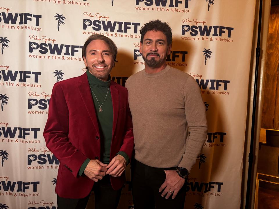 Steven Ciceron and Levi Vincent pose at PSWIFT's holiday get-together on Dec. 13, 2023.