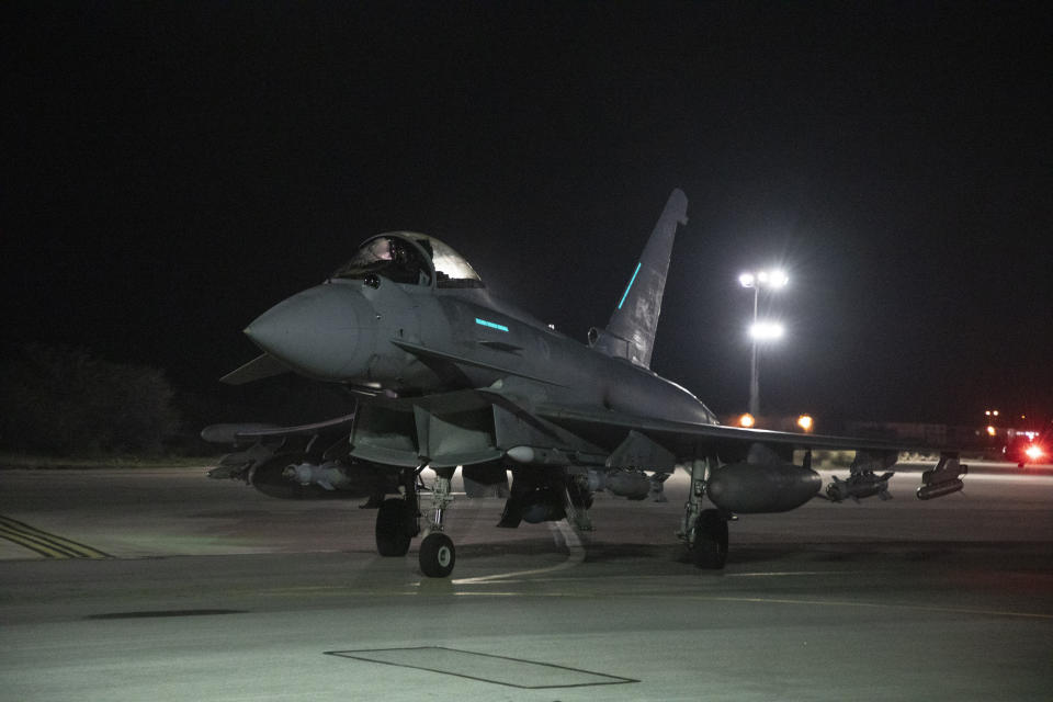 In this image provided the Ministry of Defence, an RAF Typhoon FRG4 aircraft prepares to take off to conduct further strikes against Houthi military targets in Yemen, from RAF Akrotiri, Cyprus, Saturday, Feb. 3, 2024. (Cpl Samantha Drummee/Ministry of Defence via AP)