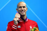 LONDON, ENGLAND - AUGUST 01: Bronze medalist Brent Hayden of Canada celebrates with his medal during the medal cermony for the Men's 100m Freestyle on Day 5 of the London 2012 Olympic Games at the Aquatics Centre on August 1, 2012 in London, England. (Photo by Clive Rose/Getty Images)