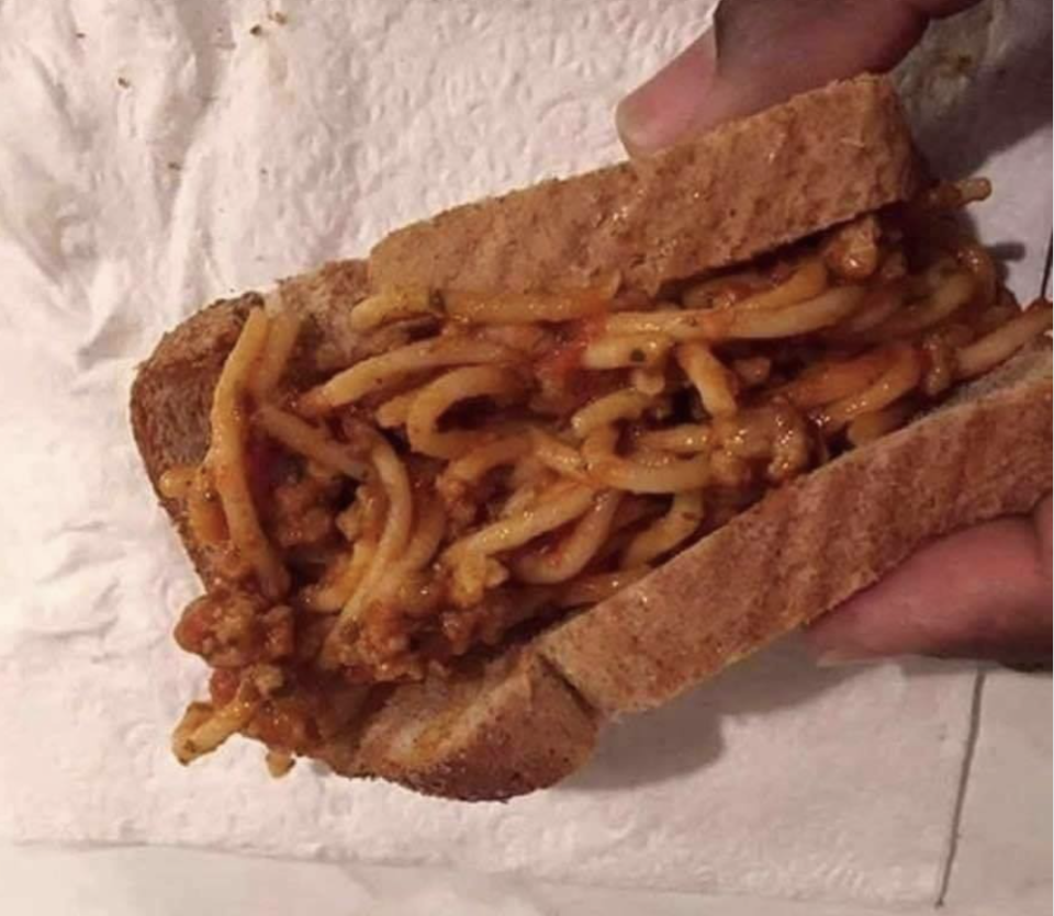 A spaghetti-in-tomato-sauce sandwich