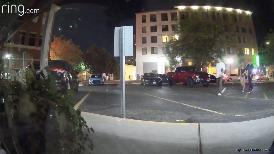 Security camera footage at a downtown Boise retail store captured three individuals, identified as Payton Wasson, left, Jordan Smith, middle, and Mario Garza, as they arrived to Garza’s black Kia sedan in the 5th Street strip mall at 2:08 a.m. on June 24. A Boise police officer shot Wasson just minutes later.