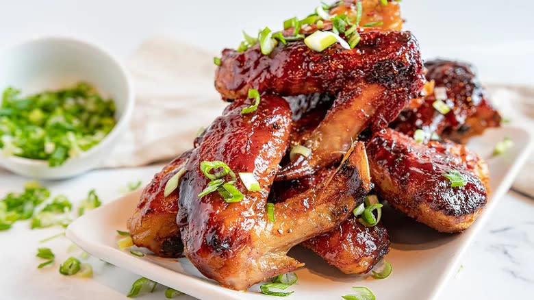 Baked chicken wings on plate 