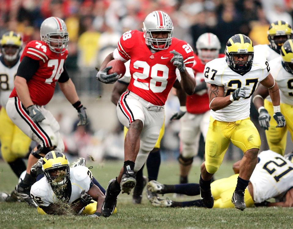 Ohio State running back Chris “Beanie” Wells scoots free on a 52-yard touchdown run against Michigan in 2006.