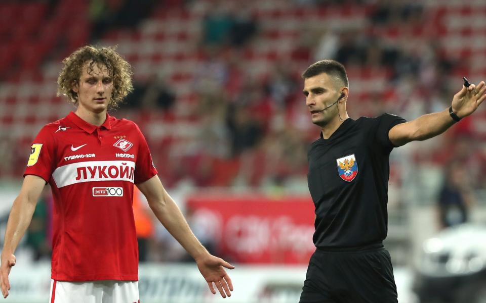 Spartak Moscows Alex Kral (L) and referee Alexei Sukhoi in a 2021/2022 Russian Premier League Round 3 football match between Spartak Moscow and FC Nizhny Novgorod at Otkritie Arena -  Anton Novoderezhkin\\TASS via Getty Images