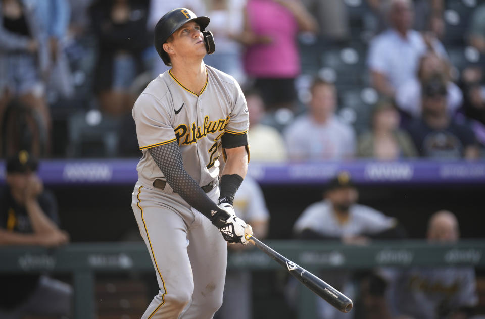 Pittsburgh Pirates' Kevin Newman flies out against Colorado Rockies relief pitcher Daniel Bard to end the ninth inning of a baseball game Monday, June 28, 2021, in Denver. (AP Photo/David Zalubowski)