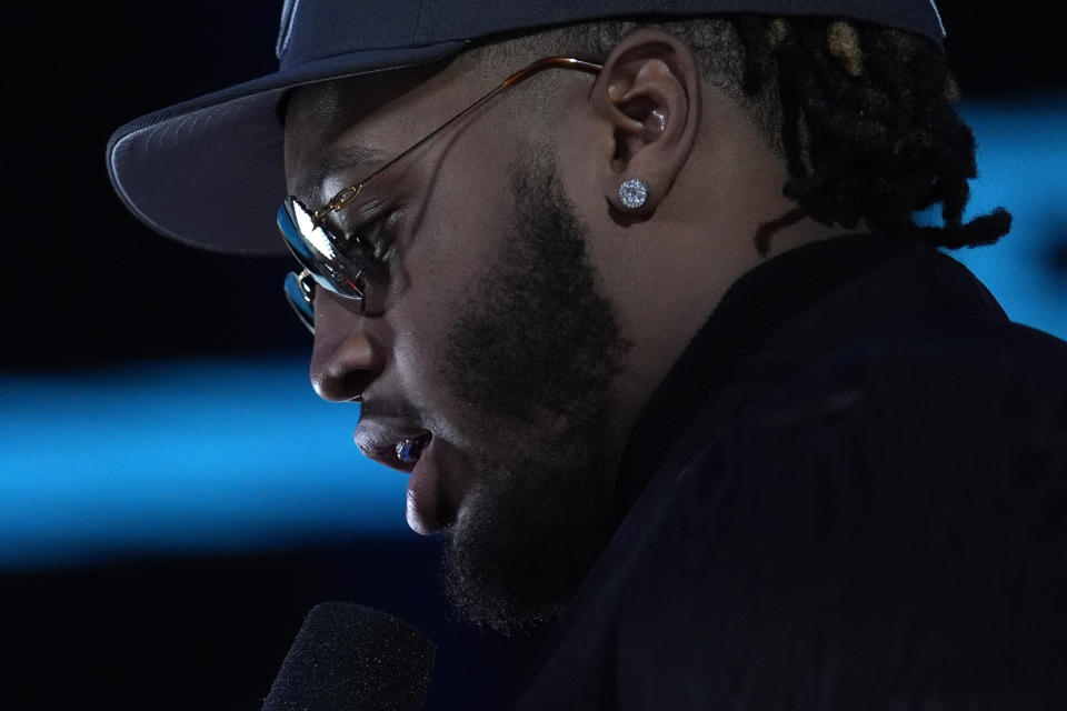 Alabama offensive lineman JC Latham does an interview after being chosen by the Tennessee Titans with the seventh overall pick during the first round of the NFL football draft, Thursday, April 25, 2024, in Detroit. (AP Photo/Jeff Roberson)