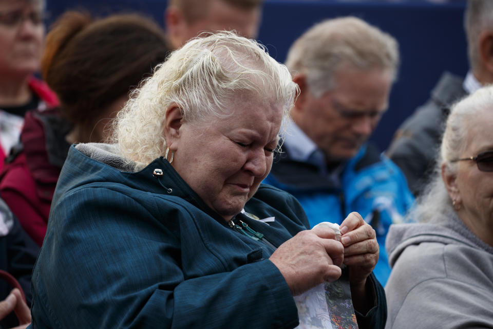 Family members of Flight 93 listens during the September 11th Flight 93 Memorial Service, Tuesday, Sept. 11, 2018, in Shanksville, Pa. (AP Photo/Evan Vucci)